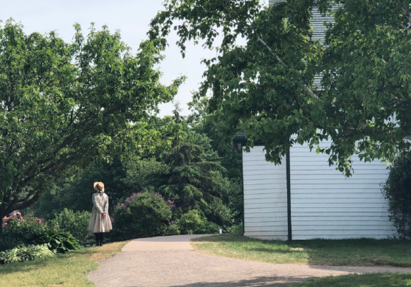 G Ashworth Girl in a Garden Image
